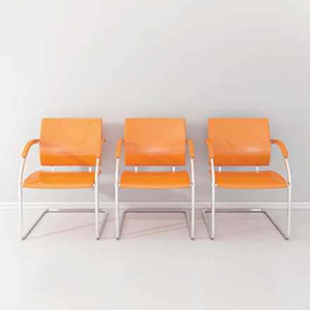 3 orange waiting rooms chairs
