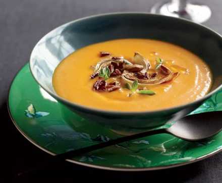 orange soup in bowl