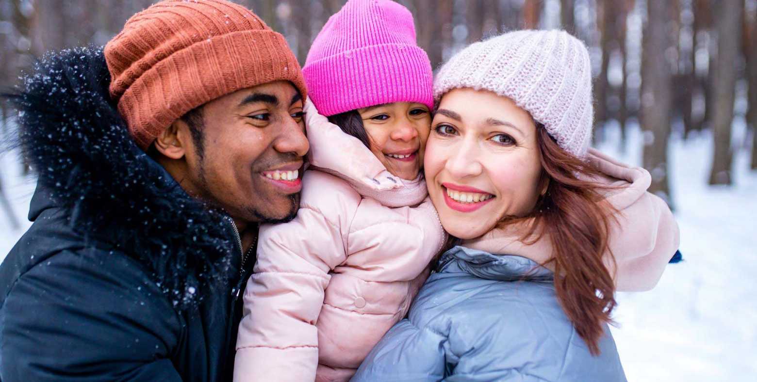 happy family in the outdoors during winter