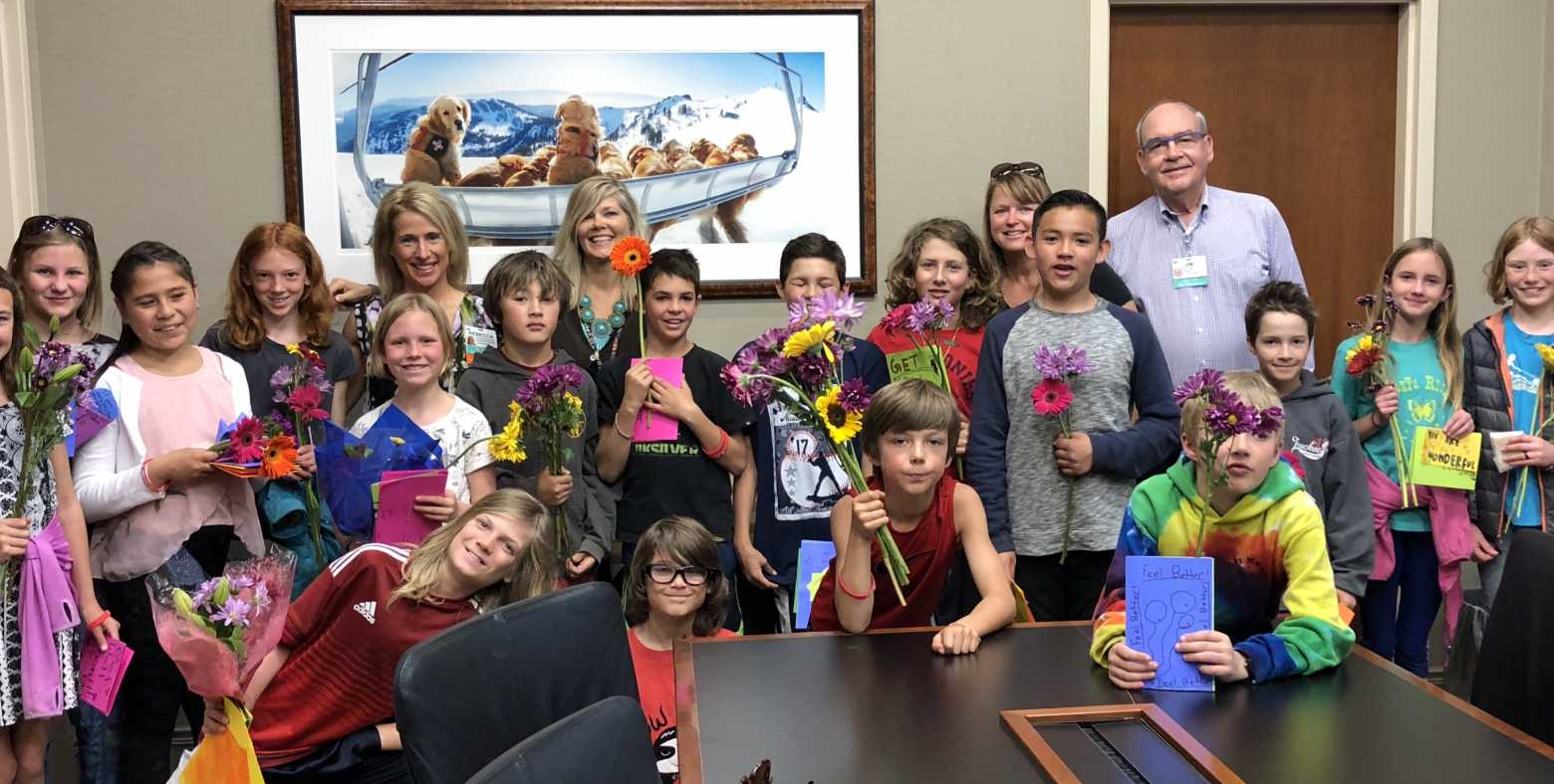 Forth and Fifth Graders from Sierra Expeditionary Learning School, joined by their teacher Lynn Akers, Gene Upshaw Memorial Tahoe Forest Cancer Center Director Jim McKenna, Operations Manger Rebecca Zadig-Escalera and Executive Director of Tahoe Forest Health System Foundation Martha Simon