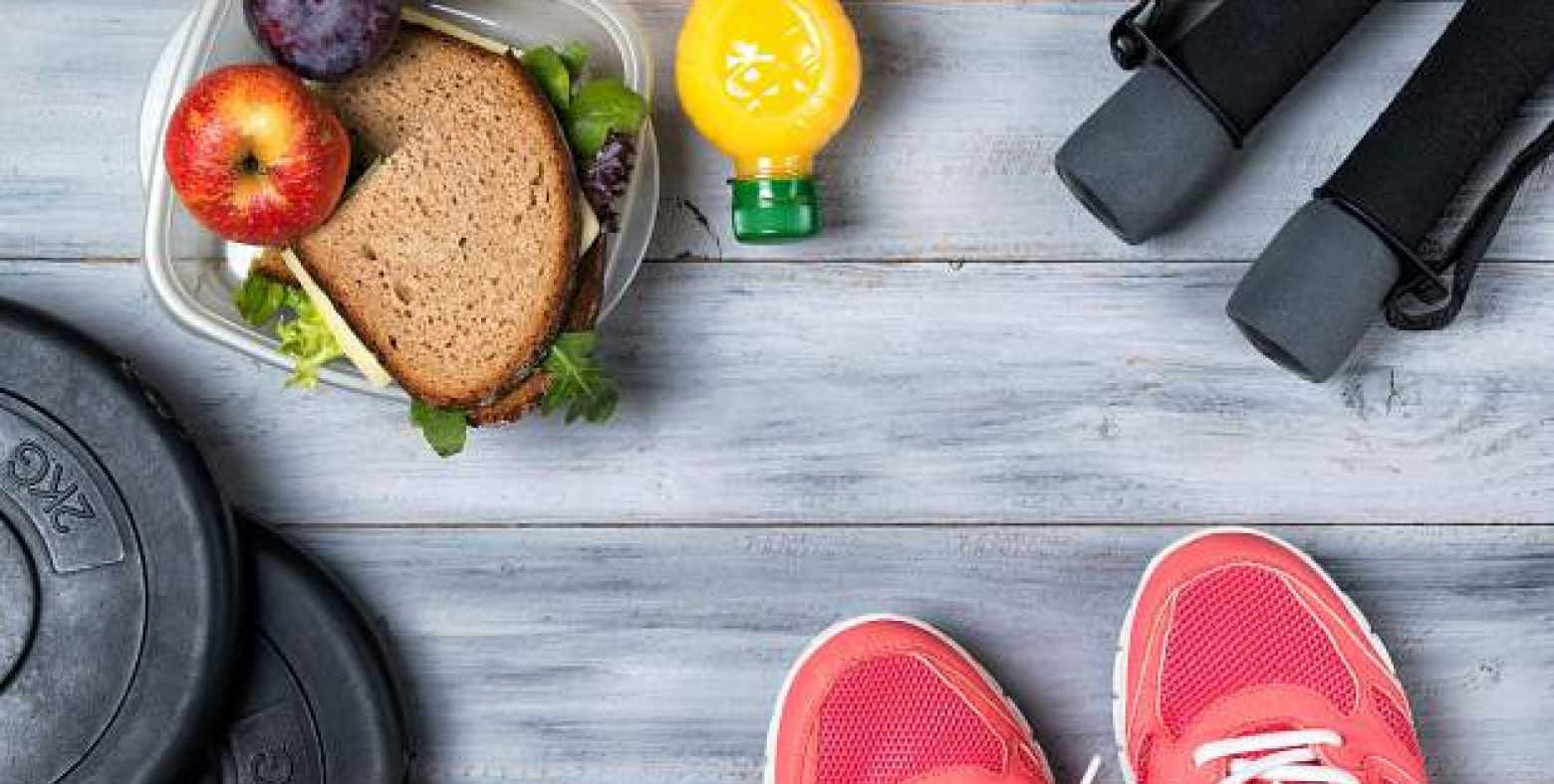 Sneakers, healthy snacks, and workout equipment