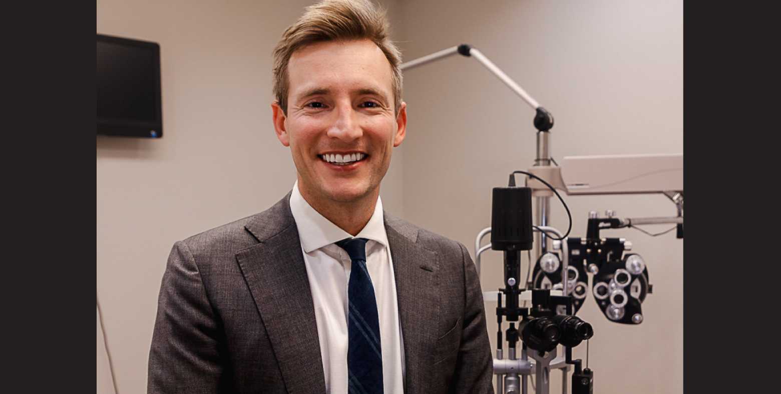 Dr. Jayson Koppinger with eye care equipment