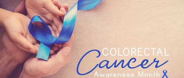 Hands holding blue ribbon with "March is National Colorectal Cancer Awareness Month"