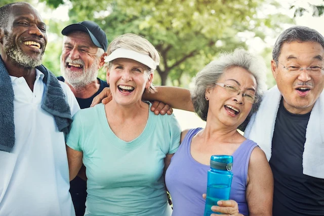 group of diverse seniors laughing together