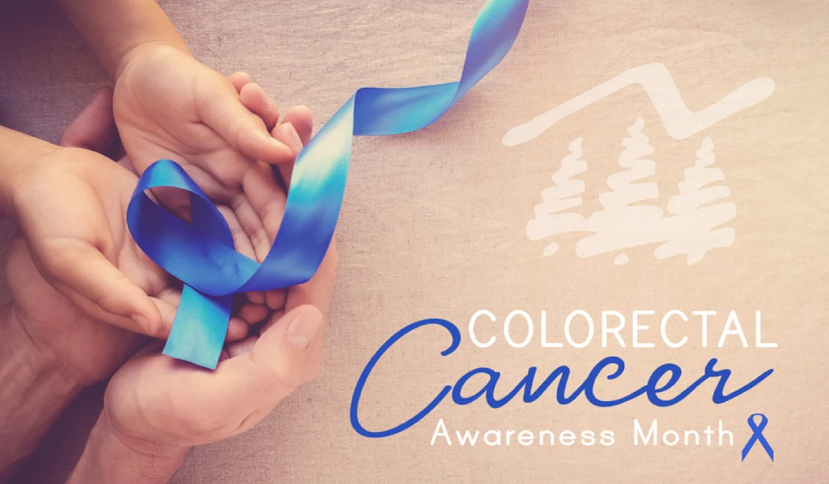 adult and child hands holding blue ribbon with Colorectal Cancer Awareness text