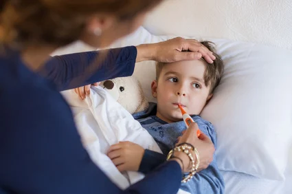 Boy measuring fever Knowing the Symptoms of Sepsis Can Save Lives