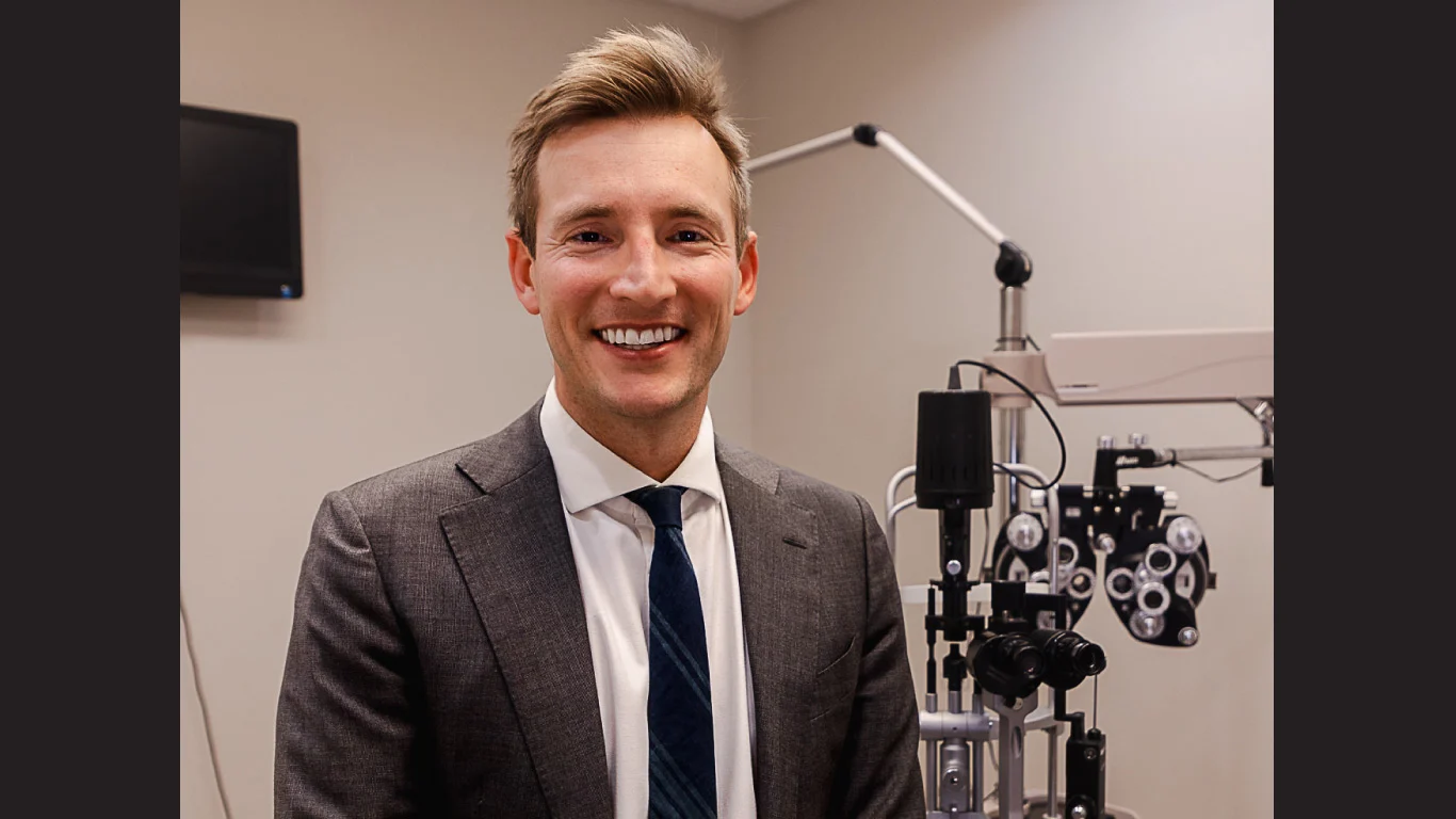 Dr. Jayson Koppinger with eye care equipment
