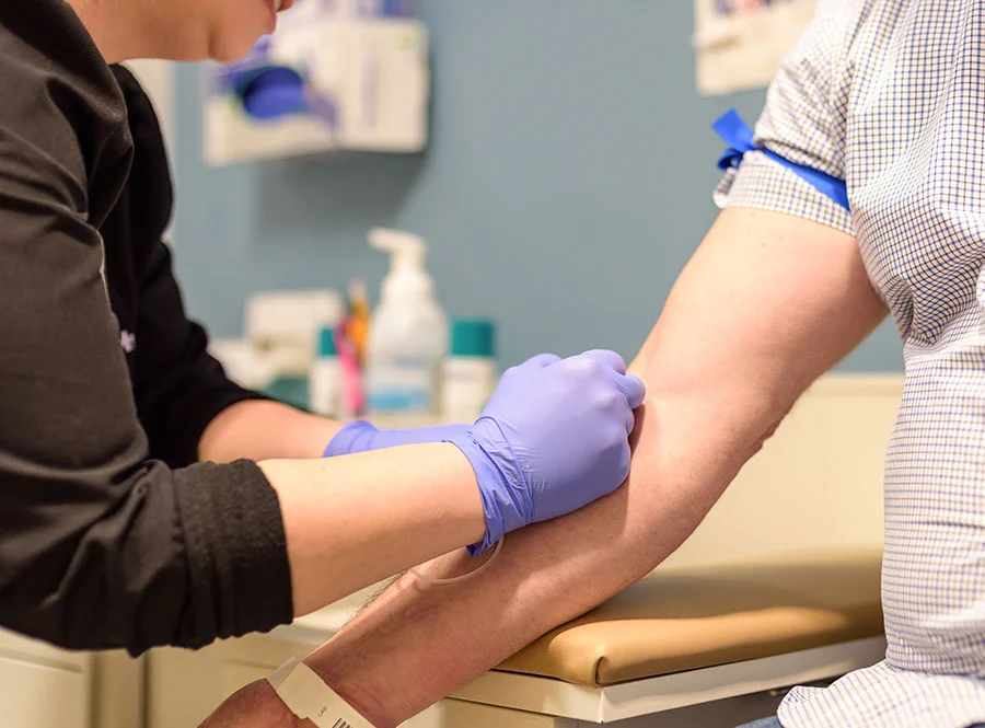 Man-getting-blood-drawn-at-routine-health-screening-1141518514_4789x3536 Man getting blood drawn