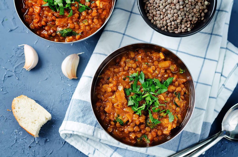 AdobeStock_167971057.small_ bowls of red lentil stew