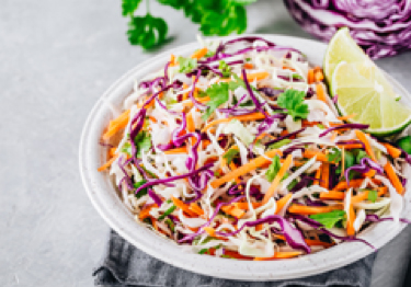 bowl of cumin-lime coleslaw