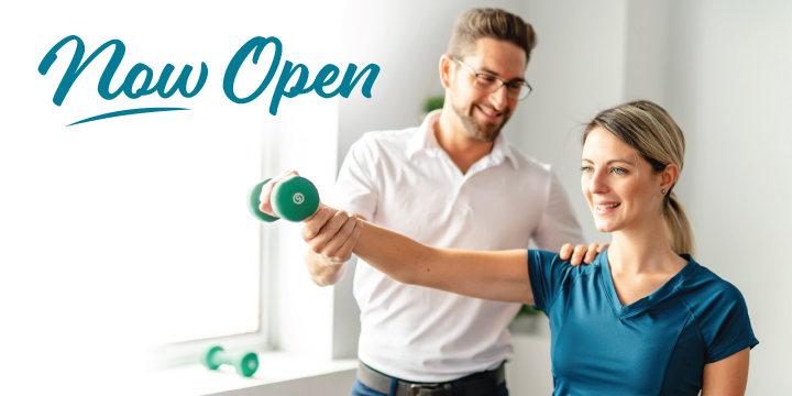 "Now Open" text and physical therapist helping patient do exercise with dumbbell