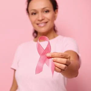 unnamed (37) women holding pink breast cancer ribbon
