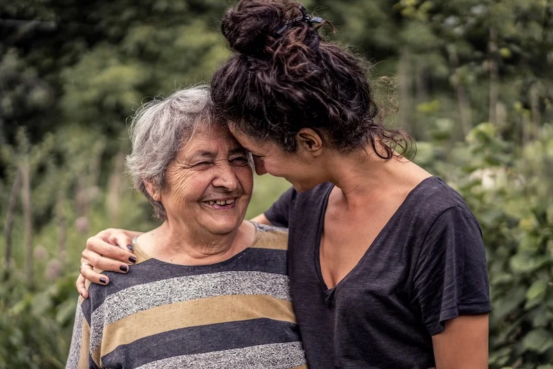 Young woman and her grandmother, very old woman. Two generations. Family love. elderly woman with young woman