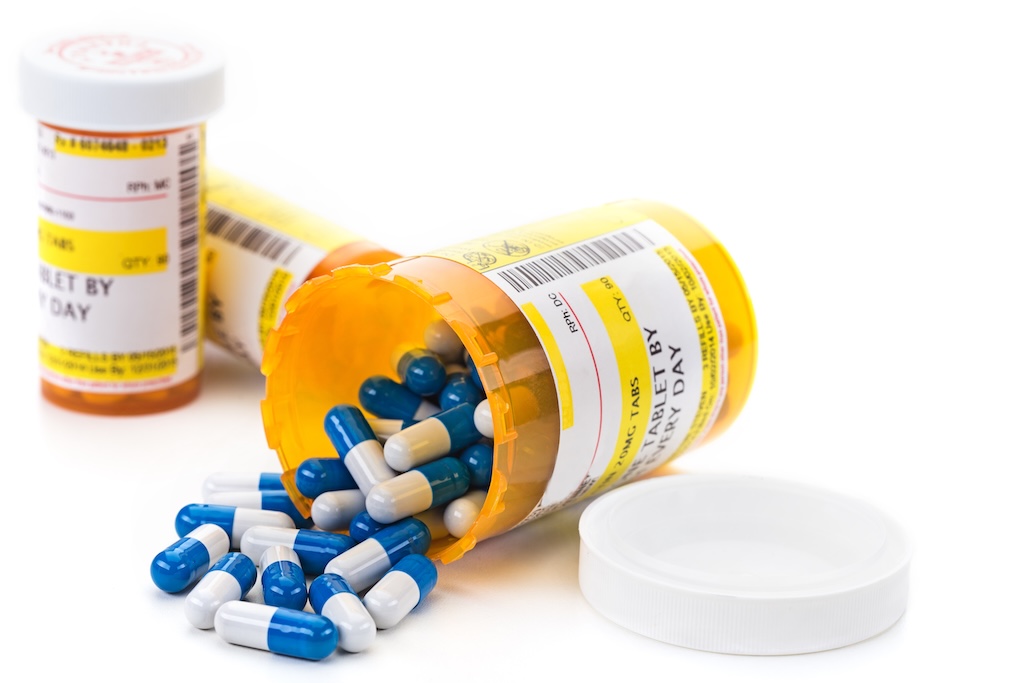 Prescription Medication in Orange Pill Bottles bottles of prescription medication