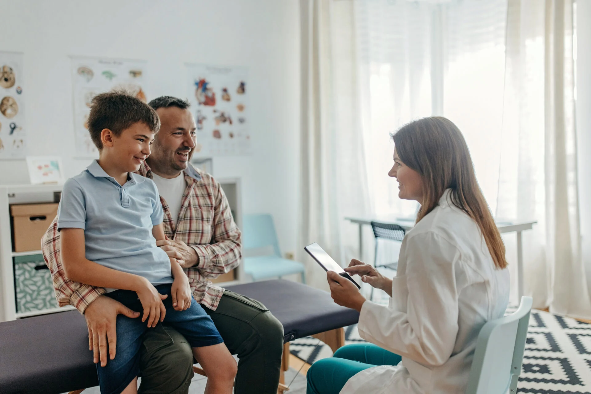 pediatrics patient, father, and doctor