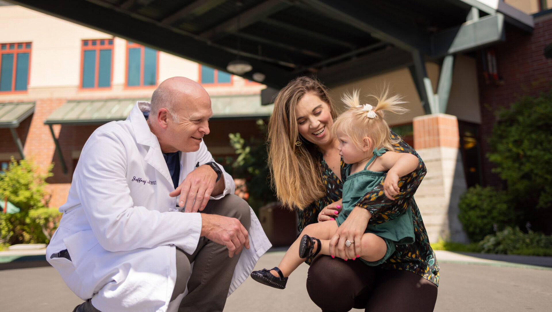 Doctor, mother and pediatric patient in front of tahoe forest hospital