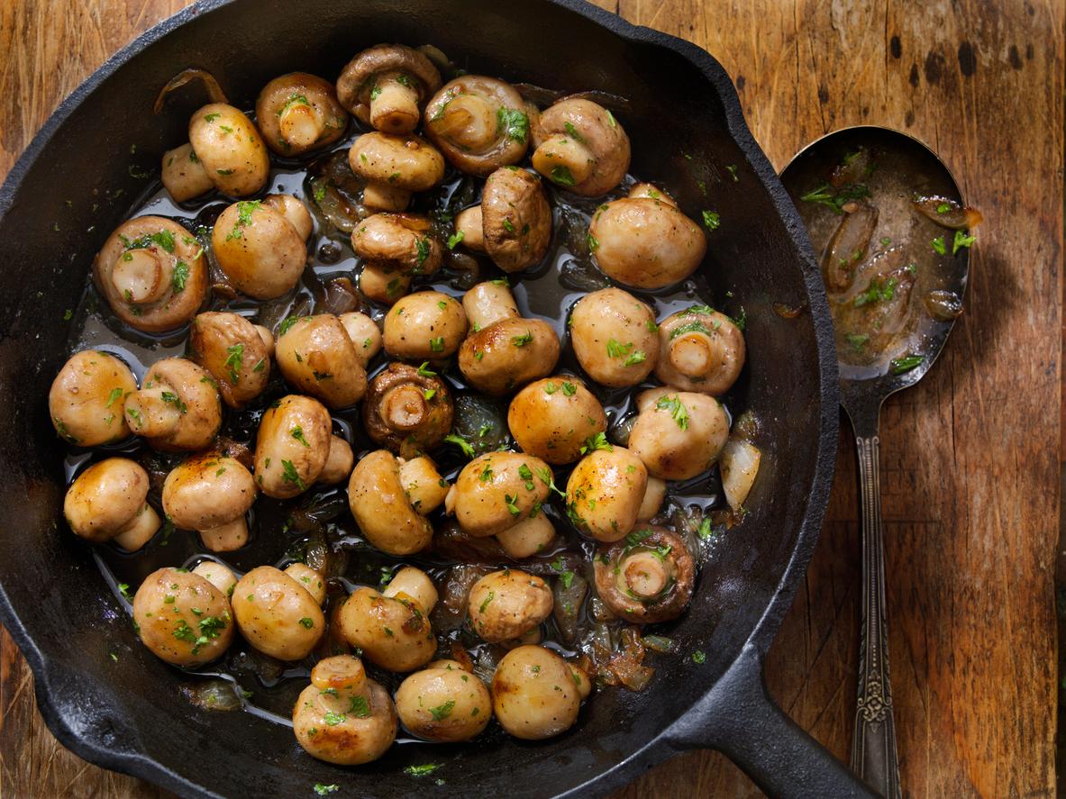 mushrooms in sauce in pan