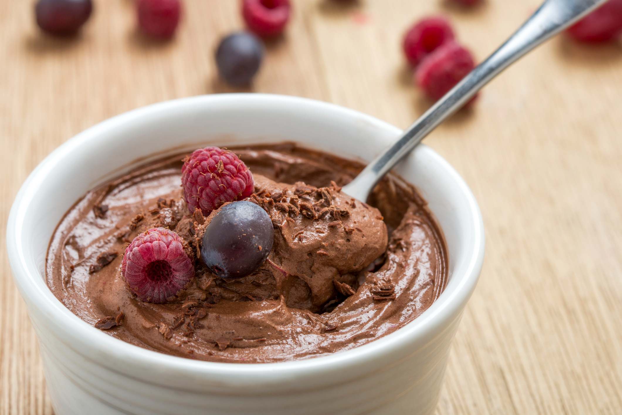 chocolate pudding topped with berries