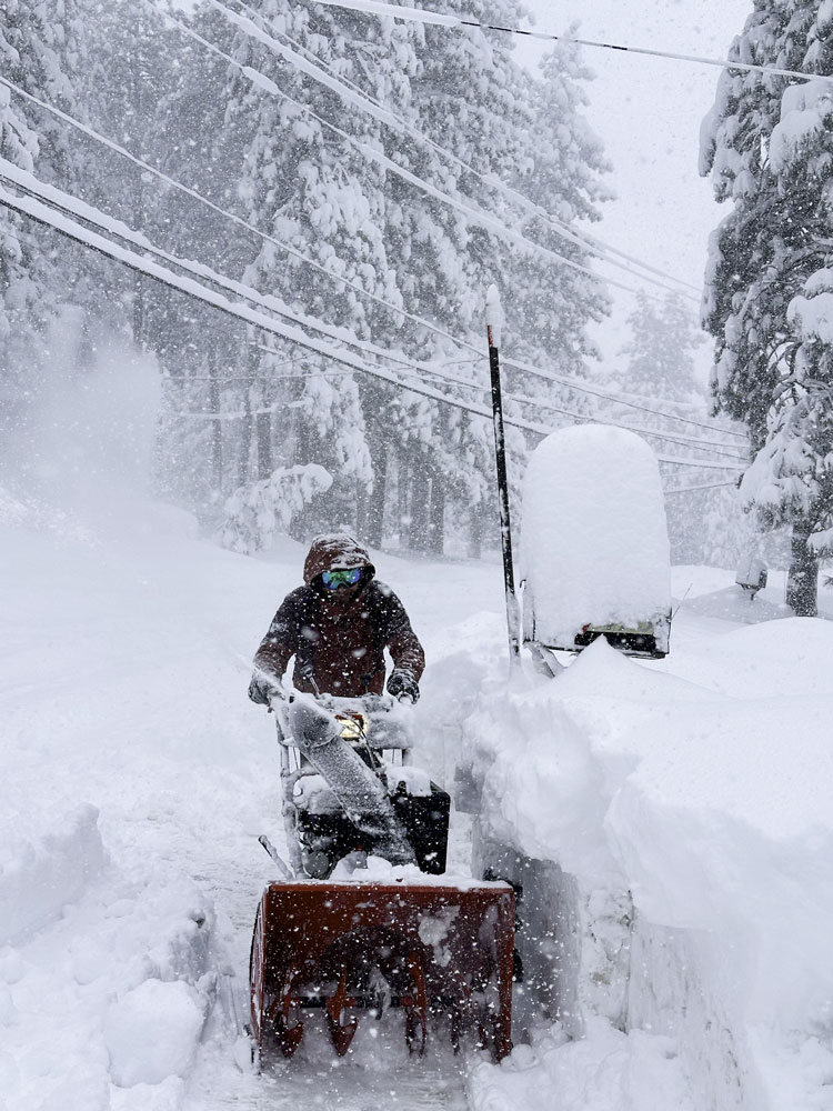 769058117-istock-2148887034 person snow blowing