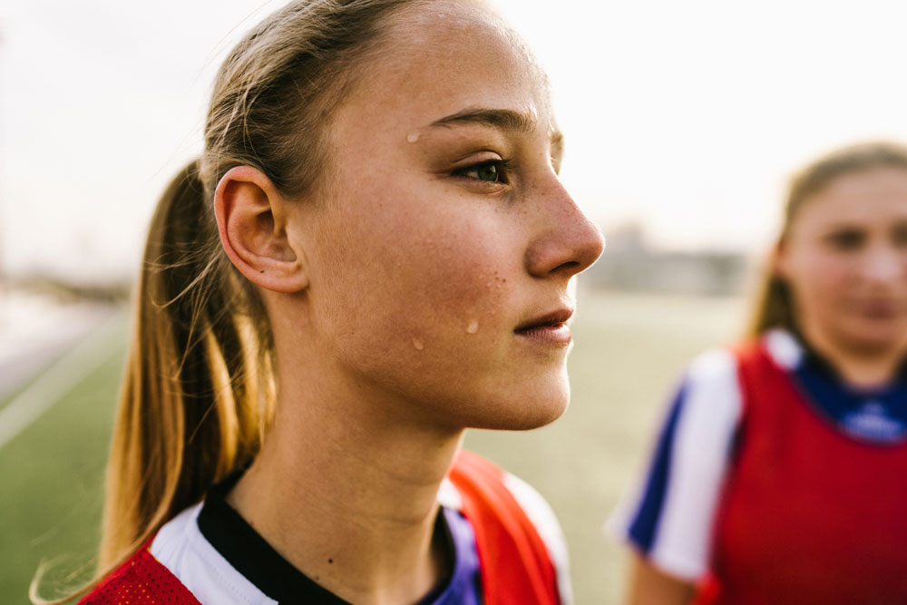 girl-in-sports-uniform-sweating girl in sports uniform sweating