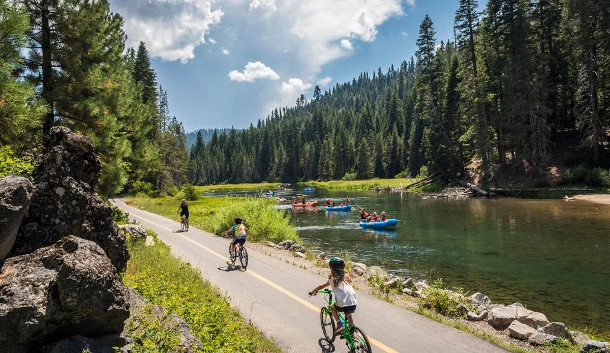 riverbikes Kids riding bikes on a trail next to Truckee River