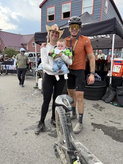 IMG_1356 web news Dr. Joshua Pfent with wife and son after finishing Leadville 100 MTB Race