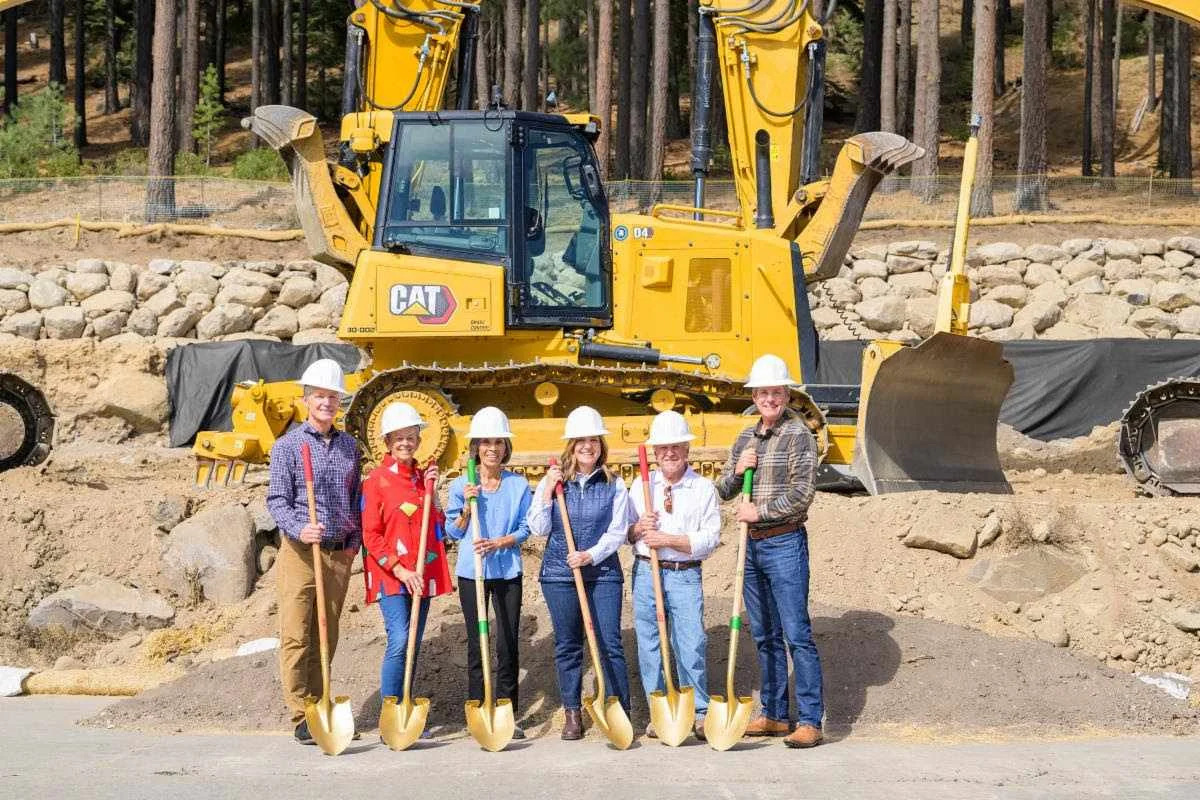 groundbreakinggoldshovel Group holds gold groundbreaking shovels