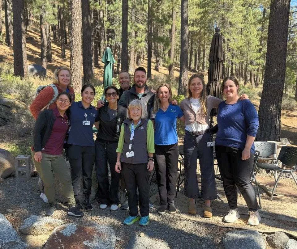 octobercelebrates group of TFHS employees gathered outdoors
