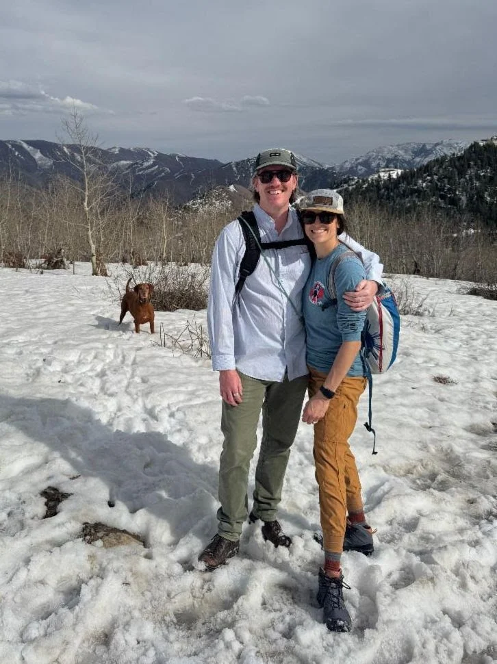 liehr Whitney Liehr and husband and dog on a snowy hike