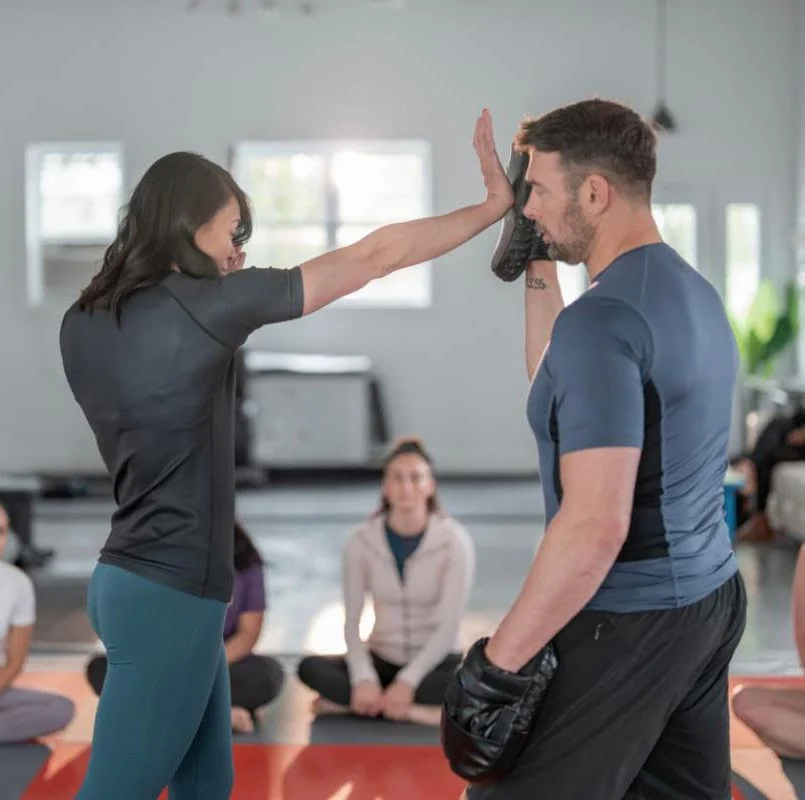 selfdefense woman deploys self defense strike with palm