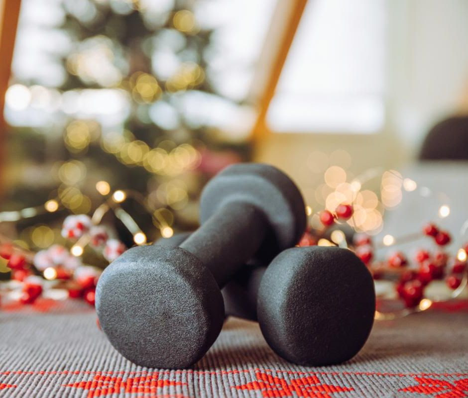 dumbells dumbbells with festive lights in background