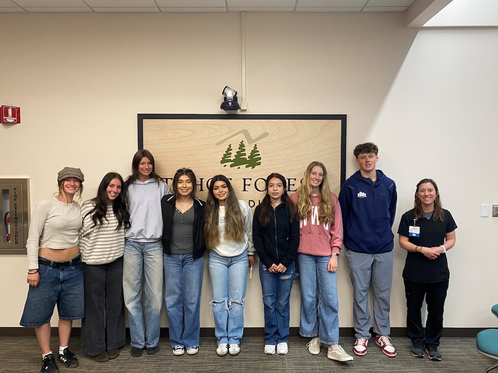 eight high school students and program coordinator
