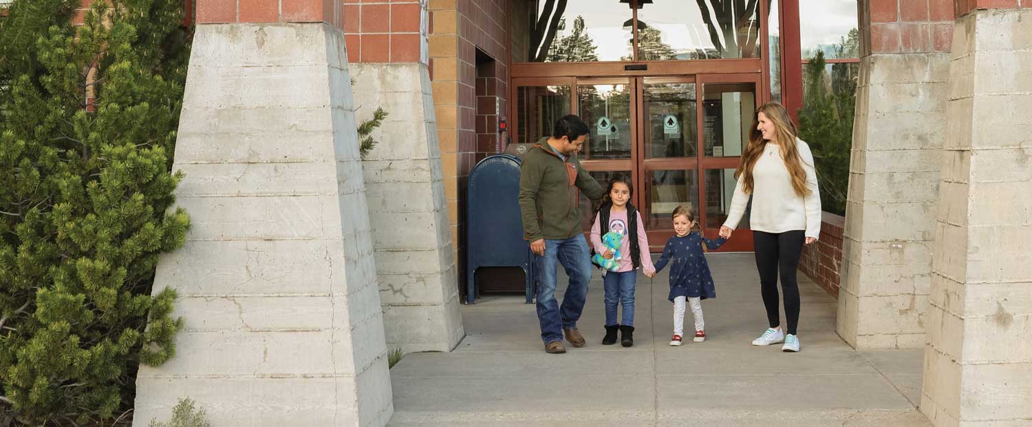 family-hospital-entrance4 Family leaving hospital together