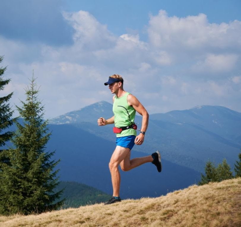 man running in the mountains