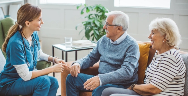 conversation a senior couple speak with a provider