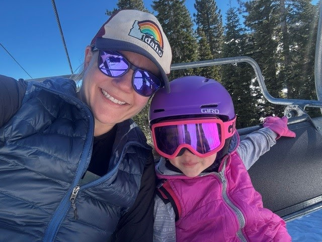 rachel Rachel Schirman and child on a ski chair