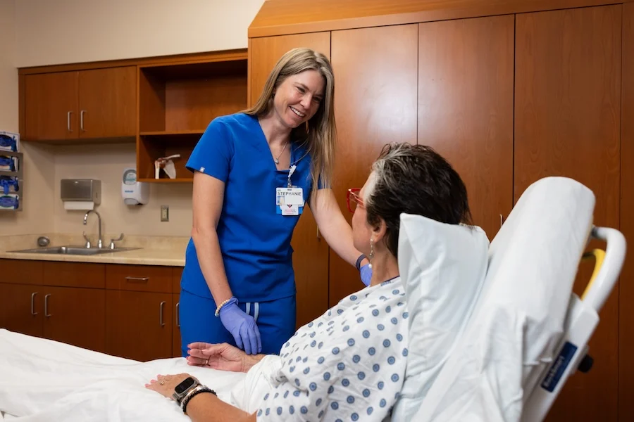 Nurse caring for a female patient